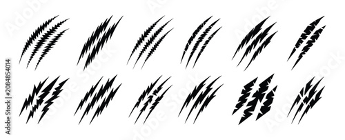 Schilderij op canvas Claw Marks Set: A collection of diverse black claw marks, depicting a fierce and wild force leaving its impression on a surface