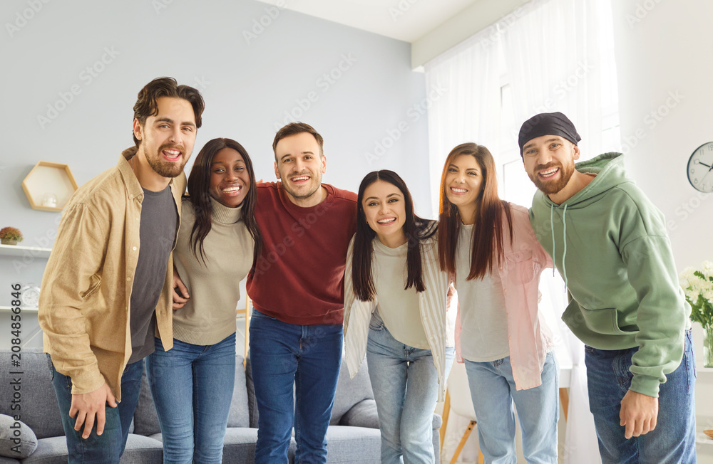 Obraz premium Friends team, happy unity common group hug, community supporting each other, following teambuilding joy and amuse, old friends and classmates reunion, coming together to enjoy friendly time 