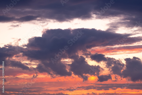 Dramatic sky sunset clouds glowing horizon colorful evening cloudscape creating stunning natural background for travel weather themes