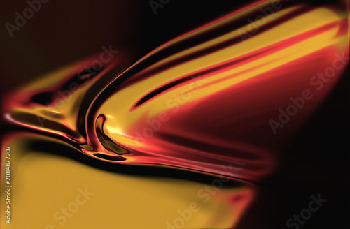 Abstract flowing metallic liquid with glossy red, gold, and black reflections, creating a luxurious futuristic background.
