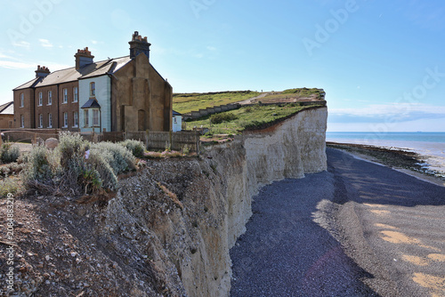 Canvastavla Cliffside cottages at Birling Gap near Seven Sisters white chalk cliffs, South D