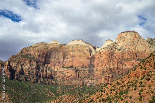 Quadro su tela The Court of the Patriarchs sandstone peaks rising under a dramatic cloudy sky i