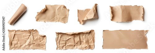 Set of crumpled and torn old paper pieces. Vintage aged parchment textures with rolled scroll. Weathered paper fragments on white background
