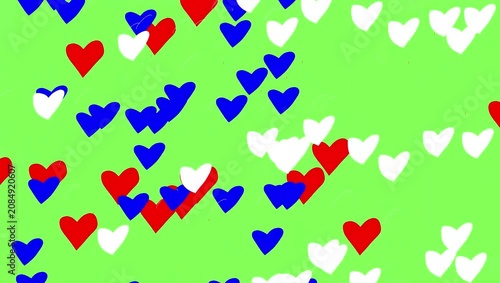 Colorful hearts float against a vibrant green background. Red, blue, and white shapes drift in a lively, festive motion. Perfect for romantic or celebratory digital designs. Ideal for Valentine's Day