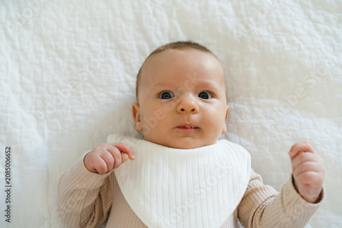 Εκτύπωση καμβά Portrait of a two to three month old baby with visible drool on lips