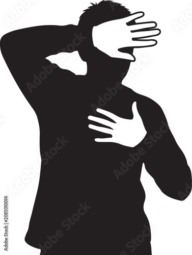 Silhouette of a man hiding his face and chest with hands in a gesture of shame