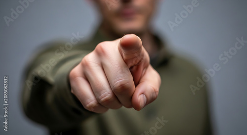 Man pointing finger in direction.