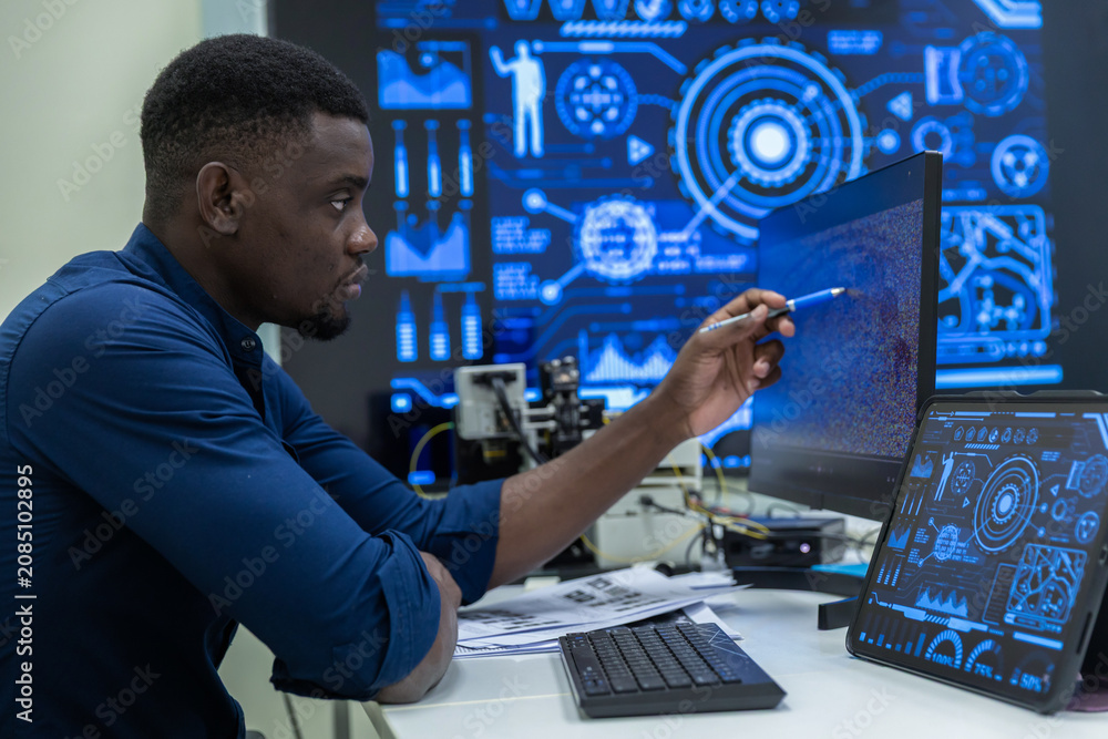 Fototapeta premium Black Researcher Making a Quantum Computing Experiment, Monitoring Live Artificial Intelligence Data on Computer Screen,