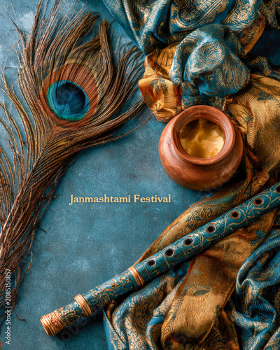 Janmashtami Festival Greeting with Krishna Flute and Peacock Feather