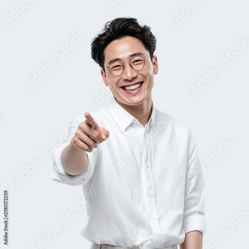 Smiling Man Pointing at Camera, Recommendation and Presentation Concept