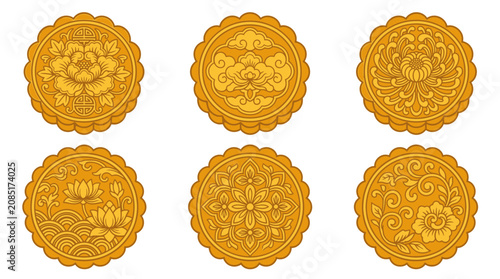 A collection of intricately designed mooncakes on a table indoors.