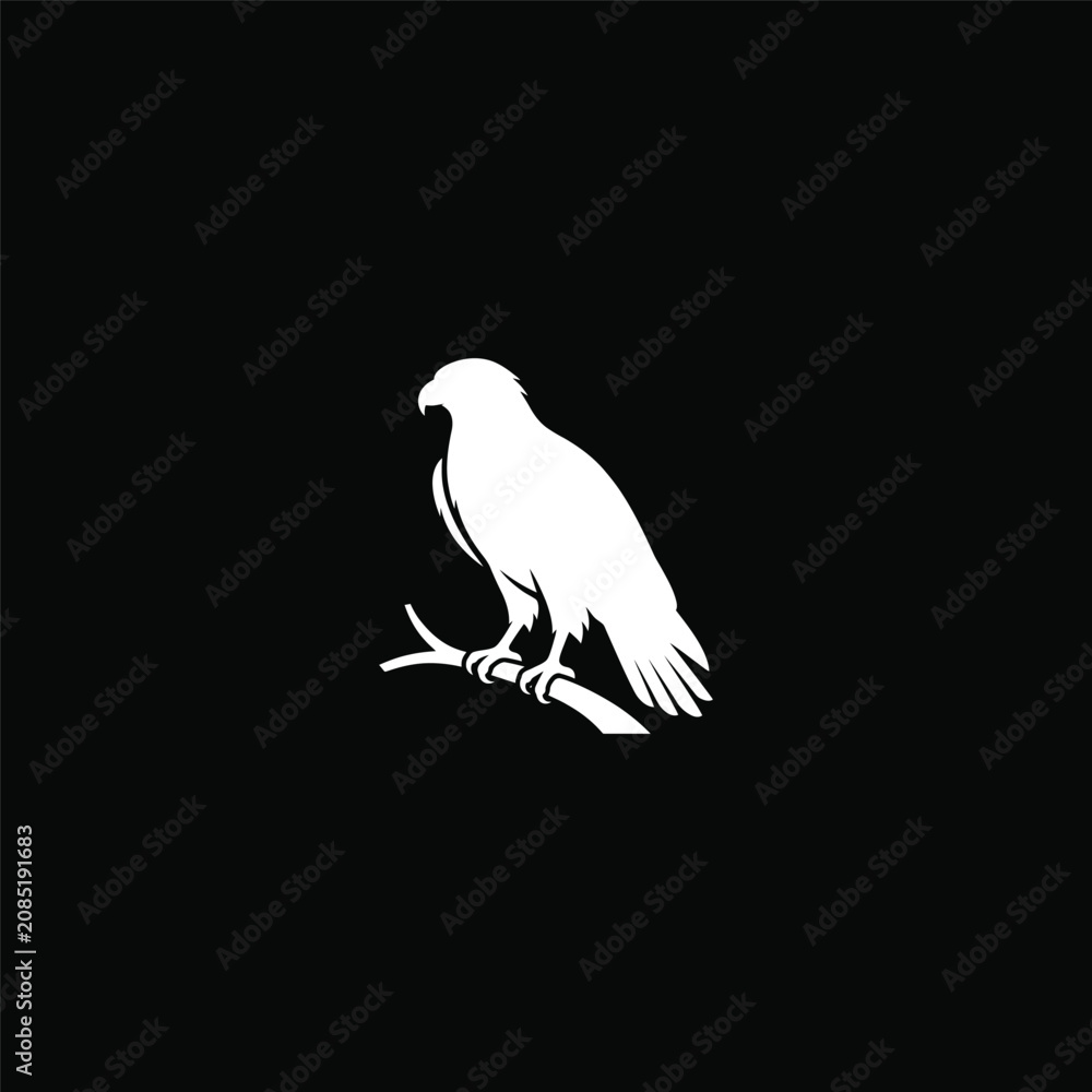 Fototapeta premium White eagle silhouette perched on a branch.