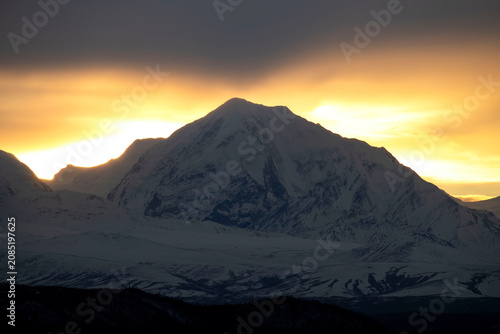 Snowy mountain at sunset in Alaska.