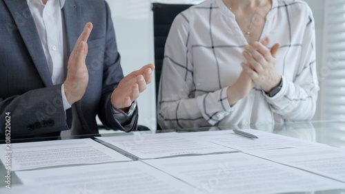 Fotografi Businesswoman clapping hands showing approval, celebrating successful contract a
