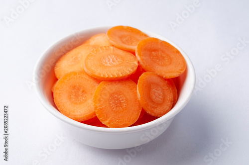 Sliced raw carrots as an ingredient in a salad or soup