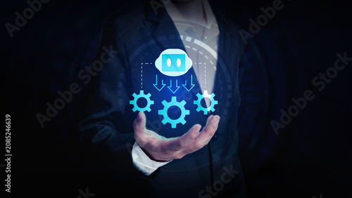 Cloud Automation Concept: A person in a suit holds out their hand, showcasing a digital illustration of cloud computing with gears symbolizing automation and data flow.