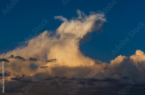 Sunlit Cumulonimbus Thunderstorm at Sunset