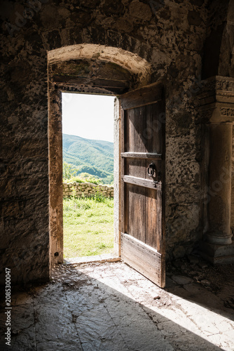 Open Wooden Door Toward Daylight