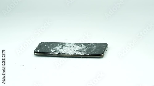 Hammer Smashing Smartphone Screen on White Background – Mobile Phone Durability Test and Destruction Concept