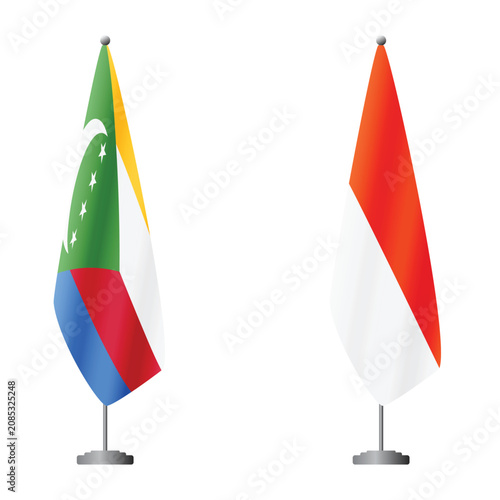 Quadro su tela Comoros and Indonesia flags on flagpoles for official ceremonies and meetings, t