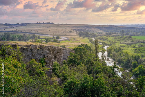 Schilderij op canvas Vibrant sunset on the Prokhorovskie Rocks in the Don Steppe, Rostov-on-Don regio