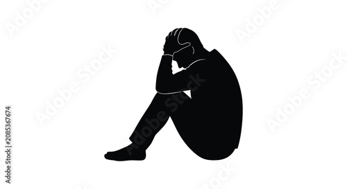 Obraz na plátně Human silhouette in seated despondent pose against a white background