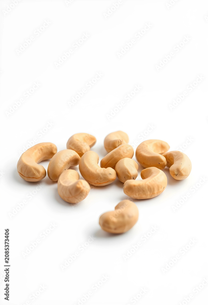 Fototapeta premium Close-up of ten cashew nuts on white background