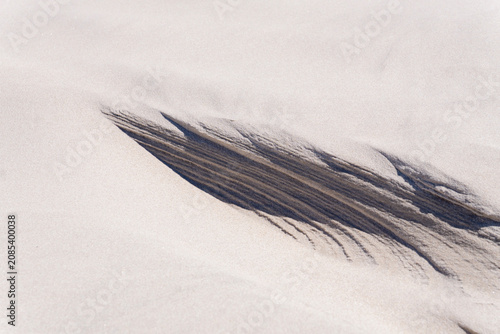 Sand beach texture and sand formations at the Karwienskie Blota beach, Baltic Sea, Karwia, Poland
