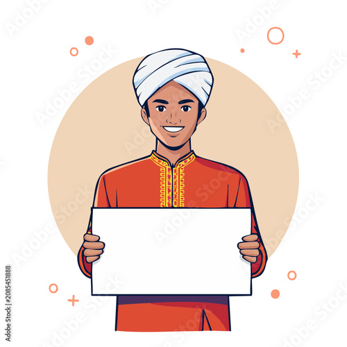 Smiling man in traditional clothing holding blank sign