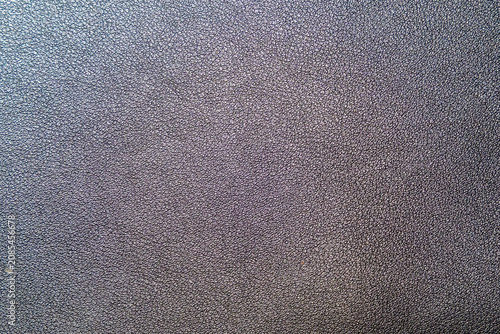 Картината върху платно Close-up texture of black leather background with fine grain pattern, ideal for