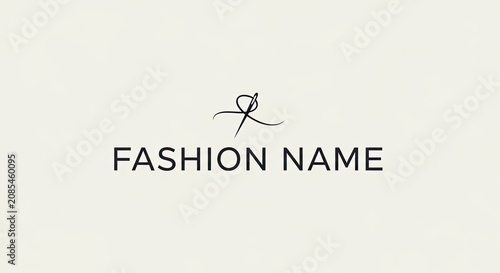 Minimalist fashion logo with elegant script and simple text.