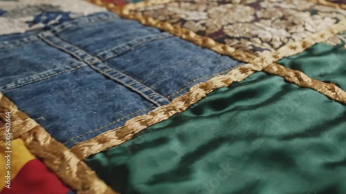 Close up of colorful patchwork quilt with plaid patterns