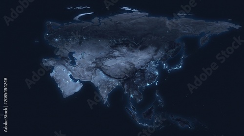Illuminated Asia map at night showing global connectivity