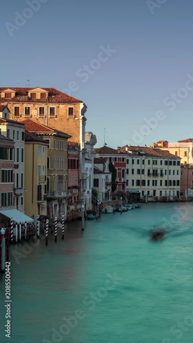 Golden hour timelapse of Venice Grand Canal featuring the dome of San Geremia church with moving shadows over historical Italian architecture