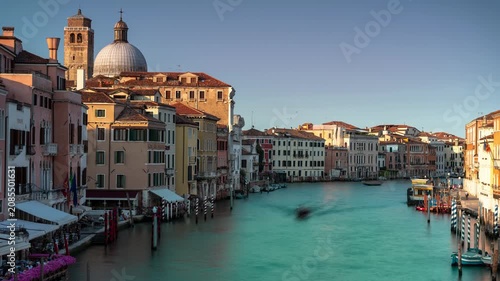 Venice Grand Canal time lapse featuring historic Italian architecture, the dome of San Geremia church, and water traffic moving down the waterway in daylight