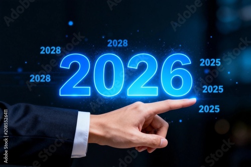 Hand Pointing at 2026 with Futuristic Numbers