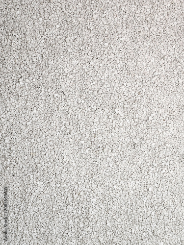 Small white stones. White sea pebbles. Small pebbles background