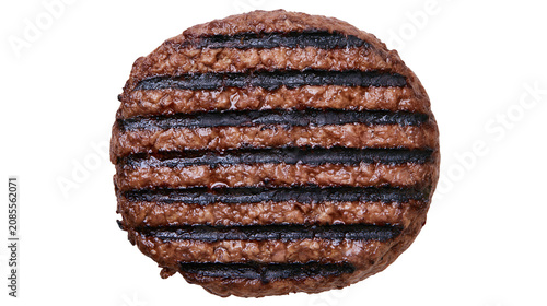 Tableau sur toile Round grilled beef burger patty with dark grill marks