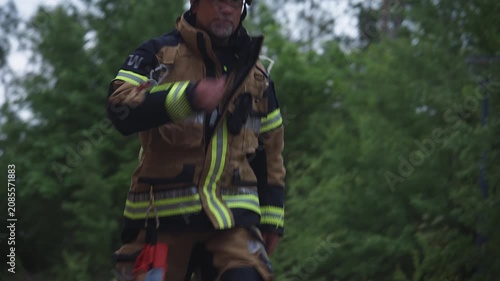 Fire Officer Walking from Fire Engine to Incident Scene