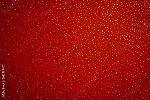 Fotografía Abstract vivid red textured background featuring soft vertical gradient stripes and a fine granulated surface pattern, ideal for commercial microstock design backdrops