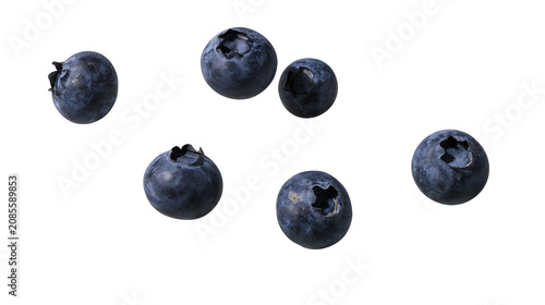 Photos Several ripe blueberries scattered on white