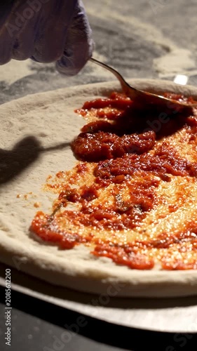 Tomato Sauce Spread on Pizza Base Video with Moody Lighting