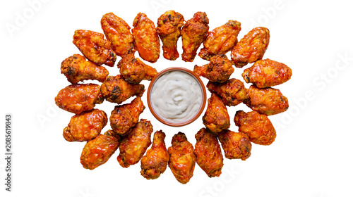 фотографія Spicy buffalo chicken wings arranged around a bowl of creamy dipping sauce