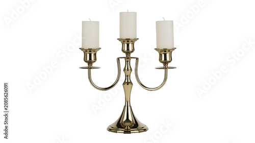 Fotografie Three white candles in a golden candelabra
