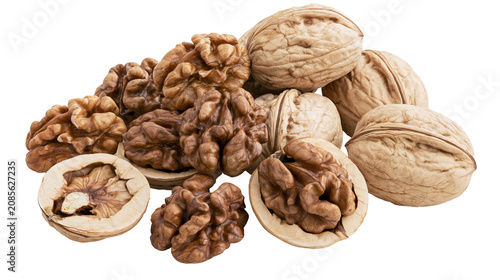 Tableau sur toile Whole and cracked walnuts with kernels visible