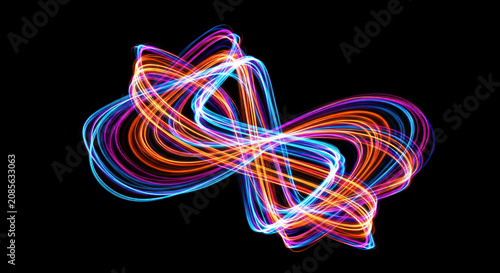 A vibrant, abstract image captures streaks of light creating a complex, interwoven pattern. The light trails form a stylized infinity symbol, showcasing a dynamic and energetic composition.