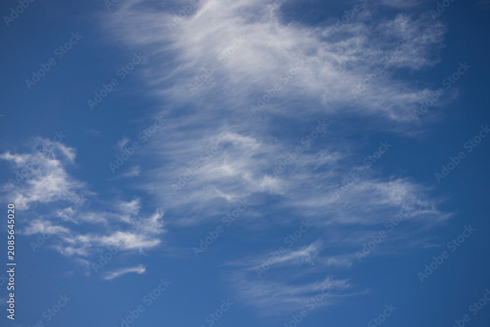Obraz premium Natural background of blue sky and white clouds.
