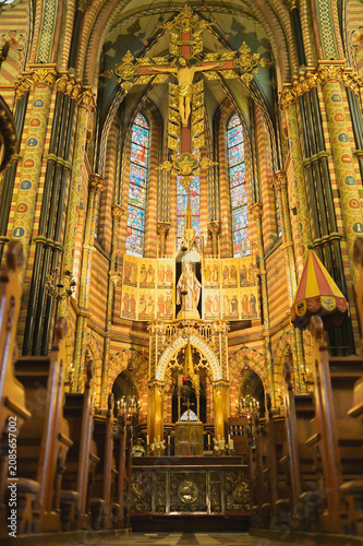 фотографія Sittard historic church interior with ornate golden altar, large crucifix, stain