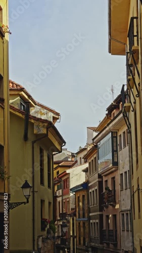 Narrow historic street between old buildings