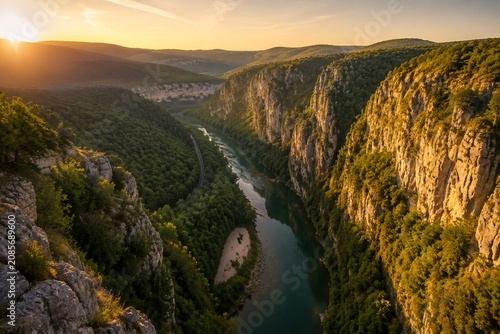 aveyron. Aerial view of lush green river winding through limestone gorge in France. travel magazines, destination branding, designed for outdoor magazines and nature guides, used by ui designers.